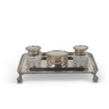 George V ink stand of shaped rectangular form having heavy gadrooned rim, central hinged compartment