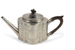 George III teapot of shaped oval form, elaborately bright cut engraved with urns, swags, vacant