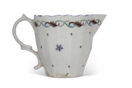 Late 18th Century Lowestoft porcelain milk jug of ribbed form decorated with sprigged design