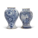 Pair of 18th Century Dutch delft vases or jars, the baluster bodies decorated with blue and white