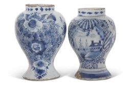 Pair of 18th Century Dutch delft vases or jars, the baluster bodies decorated with blue and white