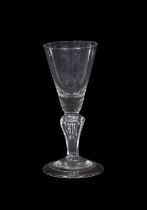 Baluster shape wine glass with trumpet bowl above folded foot, 14cm high