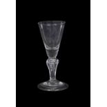 Baluster shape wine glass with trumpet bowl above folded foot, 14cm high