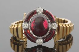 Mid-19th Century garnet and diamond bracelet/brooch circa 1860, the oval brooch set to the centre