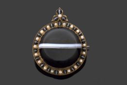 Victorian banded agate brooch, the large round cabochon agate, 30mm diameter set within a frame of