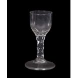 Georgian wine glass, the bucket bowl above a faceted stem, 14cm high