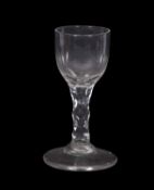 Georgian wine glass, the bucket bowl above a faceted stem, 14cm high