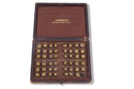 Mid 19th Century 'Juterbocks' seemless gold crowns, cased forty seven metal crown sizes (one