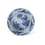 English delft dish probably Lambeth decorated with chinoiserie design, 30cm diameter