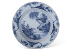 English delft dish probably Lambeth decorated with chinoiserie design, 30cm diameter