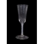 Cordial glass with drawn bowl above an opaque twist and a multi spiral tape stem, 19cm high