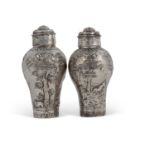 A pair of Victorian standing casters of inverted baluster form heavily chased and embossed with