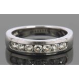 'Hearts on Fire' platinum diamond half eternity ring, chanel set with seven round brilliant cut