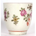 Lowestoft coffee cup circa 1770 decorated with flowers by the tulip painter within a brown line rim