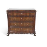 19th Century continental mahogany chest of four drawers, top drawer with three compartments and