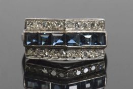 Art Deco precious metal sapphire and diamond ring, a ridge design with a central band of calibre cut