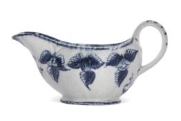 Rare Lowestoft porcelain sauce boat with a moulded fruiting and berry design picked out in blue,