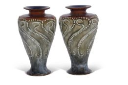 Pair of Royal Doulton art nouveau vases by Frank Butler, factory mark and artists monogram to