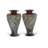 Pair of Royal Doulton art nouveau vases by Frank Butler, factory mark and artists monogram to