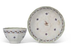 Late 18th Century Lowestoft porcelain tea bowl and saucer of fluted shape decorated with a chantilly