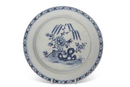 Rare small size Lowestoft porcelain plate circa 1765, the centre decorated with rock work and