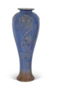 Large Royal Doulton vase by Frank Pope of inverted ballister form, the blue ground with tube-lined