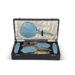 George VI cased six piece silver backed dressing table set, each item with pale blue guilloche