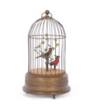 20th Century automaton formed as two singing birds in a cage, 29cm high