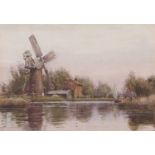 Charles Mayes Wigg (British,1889-1969) Broads scene with windmill and wherry, watercolour, signed,