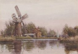 Charles Mayes Wigg (British,1889-1969) Broads scene with windmill and wherry, watercolour, signed,