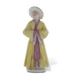 Mid 18th Century figure possibly Meissen of a chinaman with a smiling face in a yellow cloak, 12cm