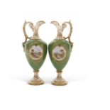 Pair of late 19th Century Coalport ewers, the green ground with gilt decoration surrounding