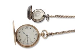 9ct gold Hunter pocket watch with a 9ct gold chain and silver coin holder fob, the pocket watch is