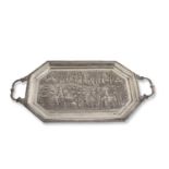 Interesting 19th/20th Century Indian white metal two handled tea tray of elongated octagonal form,