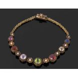 Antique multi gemstone set bracelet, the bracelet with chain links to a small flower each set with