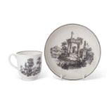 Worcester cup and saucer printed with garden statuary and obelisk on cup and unusual unrecorded