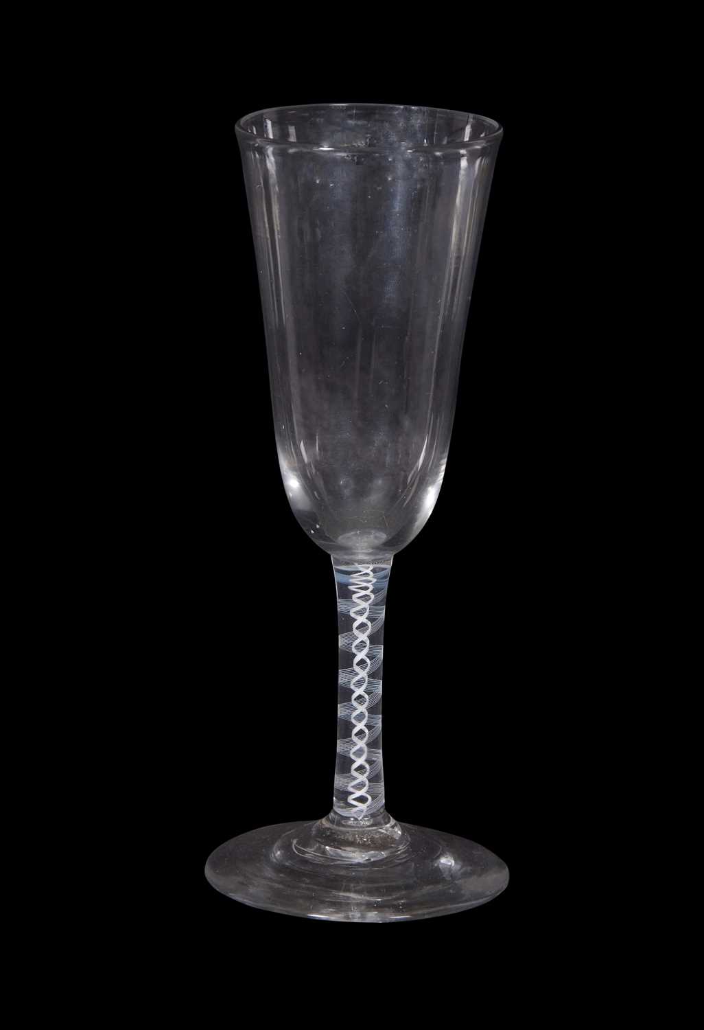 Cordial glass with drawn bowl above an opaque twist and a multi spiral tape stem, 19cm high - Image 2 of 2