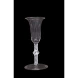 A wine glass, the bell and bowl above a twist stem with medium knop, 17cm high