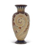 Royal Doulton vase by Frank Butler with a tube-lined art nouveau design on brown and buff ground,