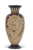 Royal Doulton vase by Frank Butler with a tube-lined art nouveau design on brown and buff ground,