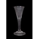 Georgian wine glass, the trumpet bowl above a clear stem and domed foot, 15cm high