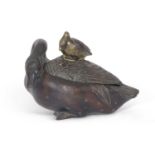 Oriental bronze model of a duck, the cover also with duck finial (restuck)