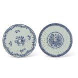 Two 18th Century Chinese porcelain large circular strainers with blue and white designs, 36cm