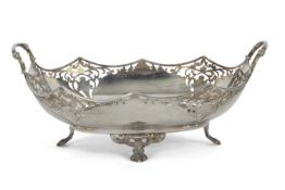 George V two handled fruit bowl of shaped oval design having pierced panels to the corners, two