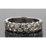 18ct white gold diamond half eternity ring designed with a double row of round brilliant cut