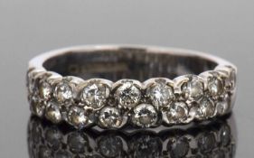 18ct white gold diamond half eternity ring designed with a double row of round brilliant cut