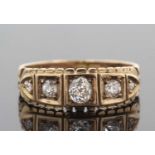 Victorian five stone diamond ring featuring five graduated old brilliant cut diamonds each in a