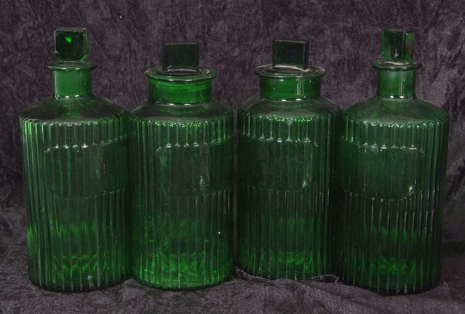 Quantity of clear glass and coloured glass chemist jars with covers or stoppers including four - Image 4 of 4