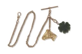 A 9ct stamped pocket watch chain with a 9ct gold horses head fob and green hard stone four leaf