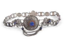 Ornate 19th/20th Century Oriental white metal belt featuring blue stone set panels and plain